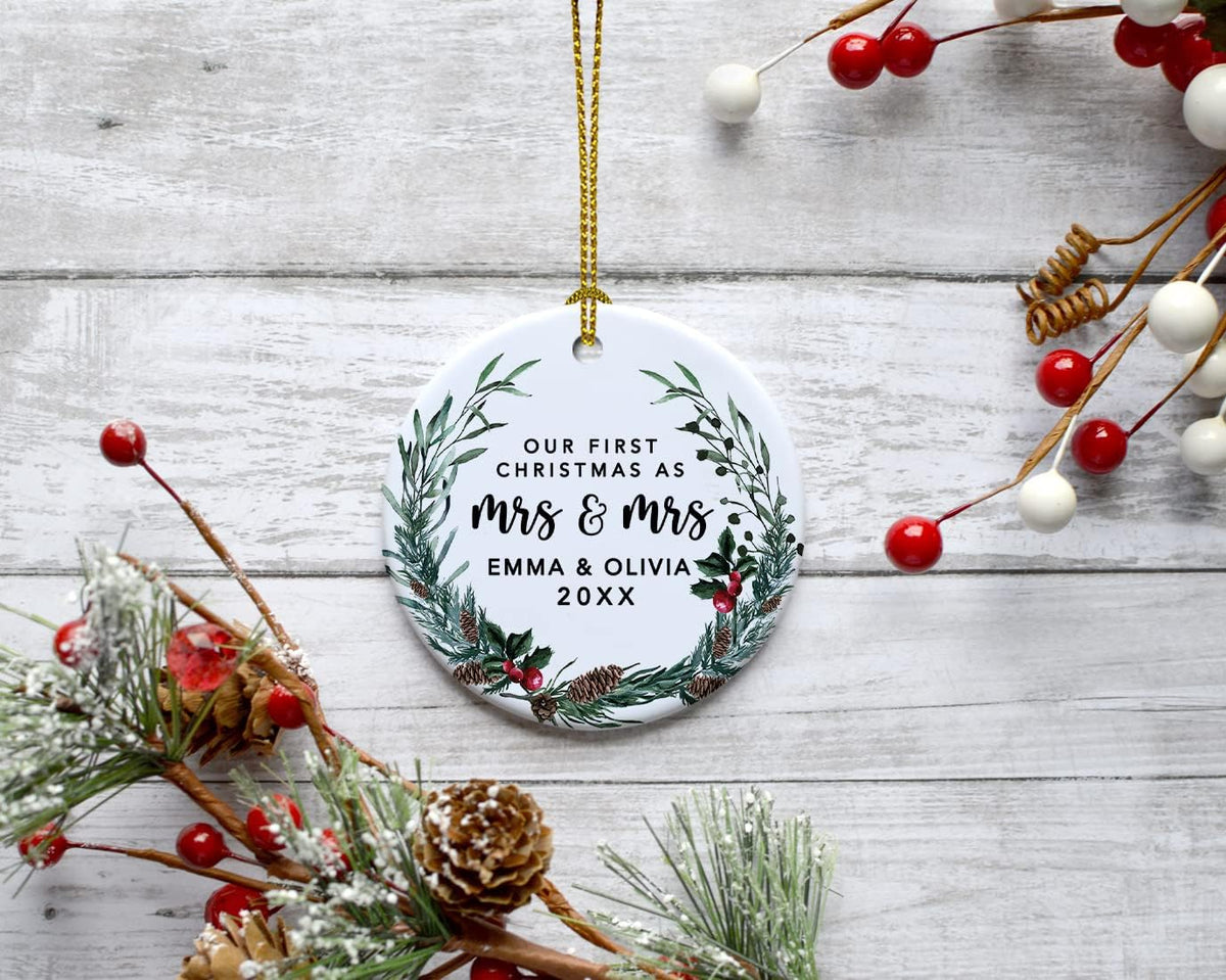 Andaz Press Personalized Our First Christmas As Mrs. & Mrs. 2025 Christmas Ornaments Holly & Pinecone Wreath 2.8" Round Porcelain Ceramic Lesbian Married Couple Gay Women Wedding Keepsake 1-Pack